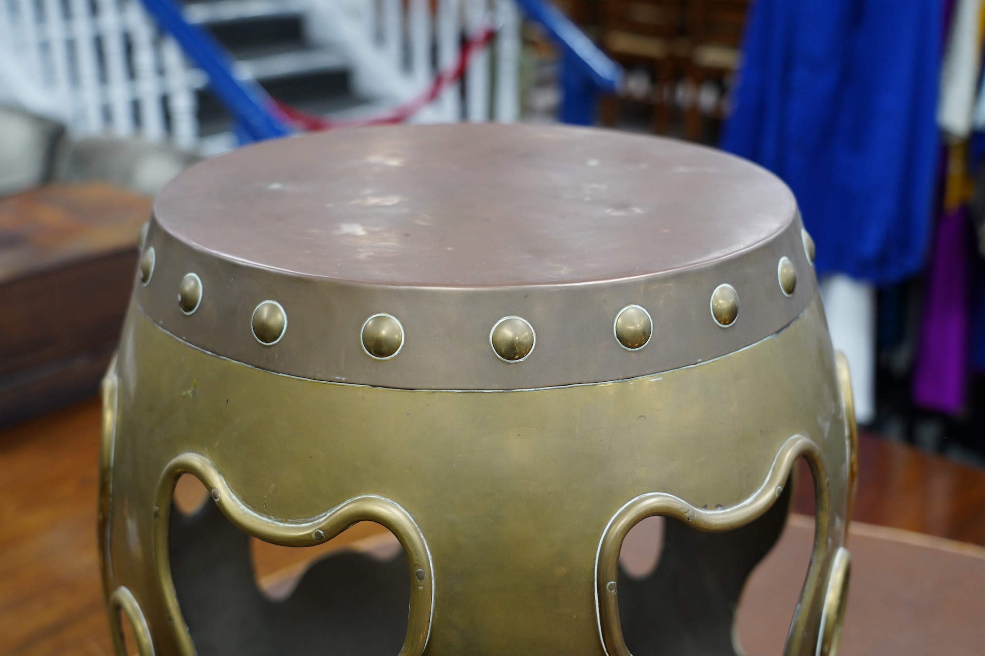 A Chinese copper and brass seat, diameter 42cm, height 46cm. Condition - fair